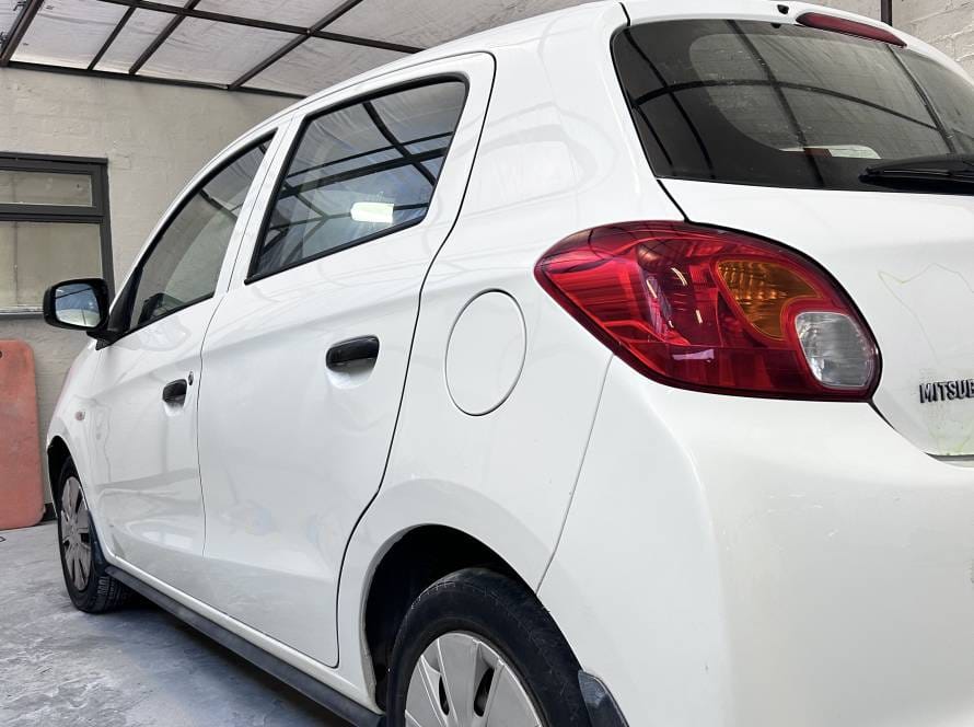 Mitsubishi Mirage dents and scratched removed
