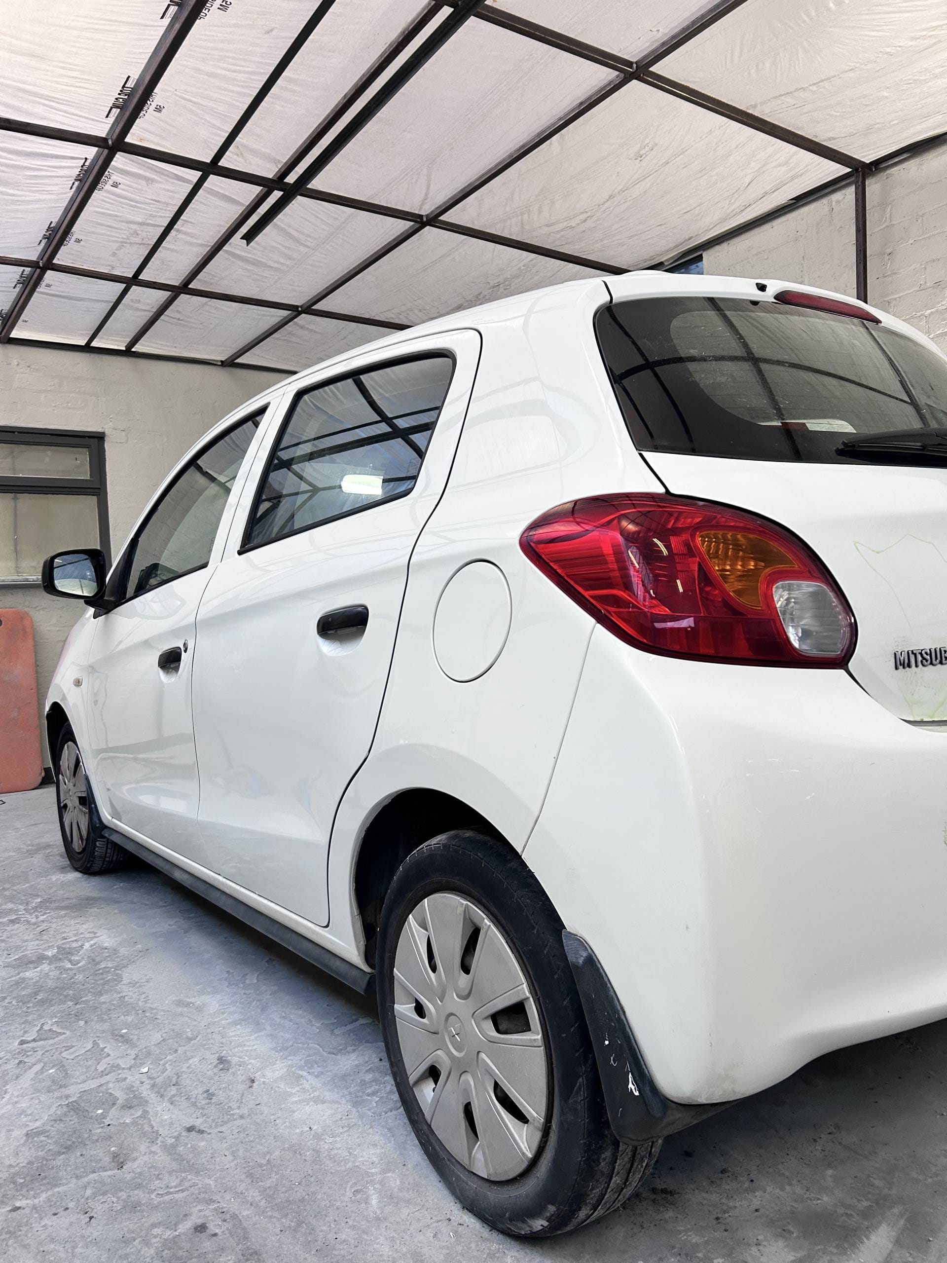 Mitsubishi Mirage dents and scratched removed