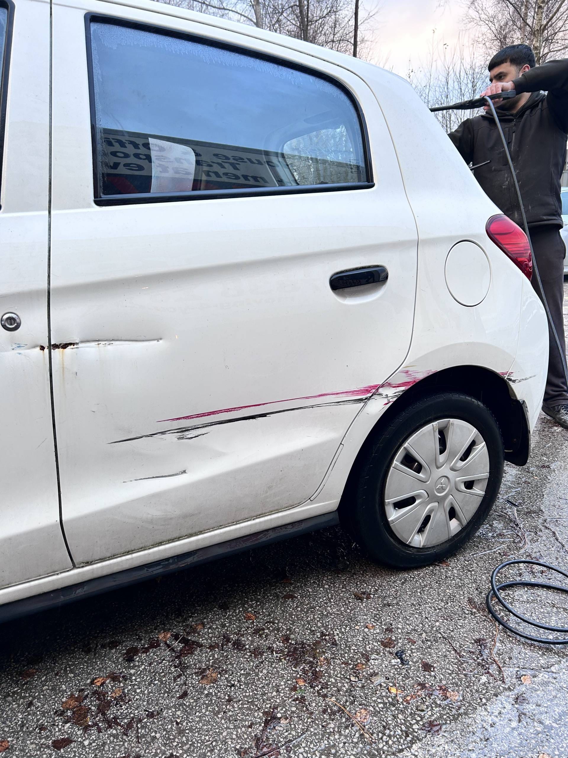 Mitsubishi Mirage dents and scratched removed